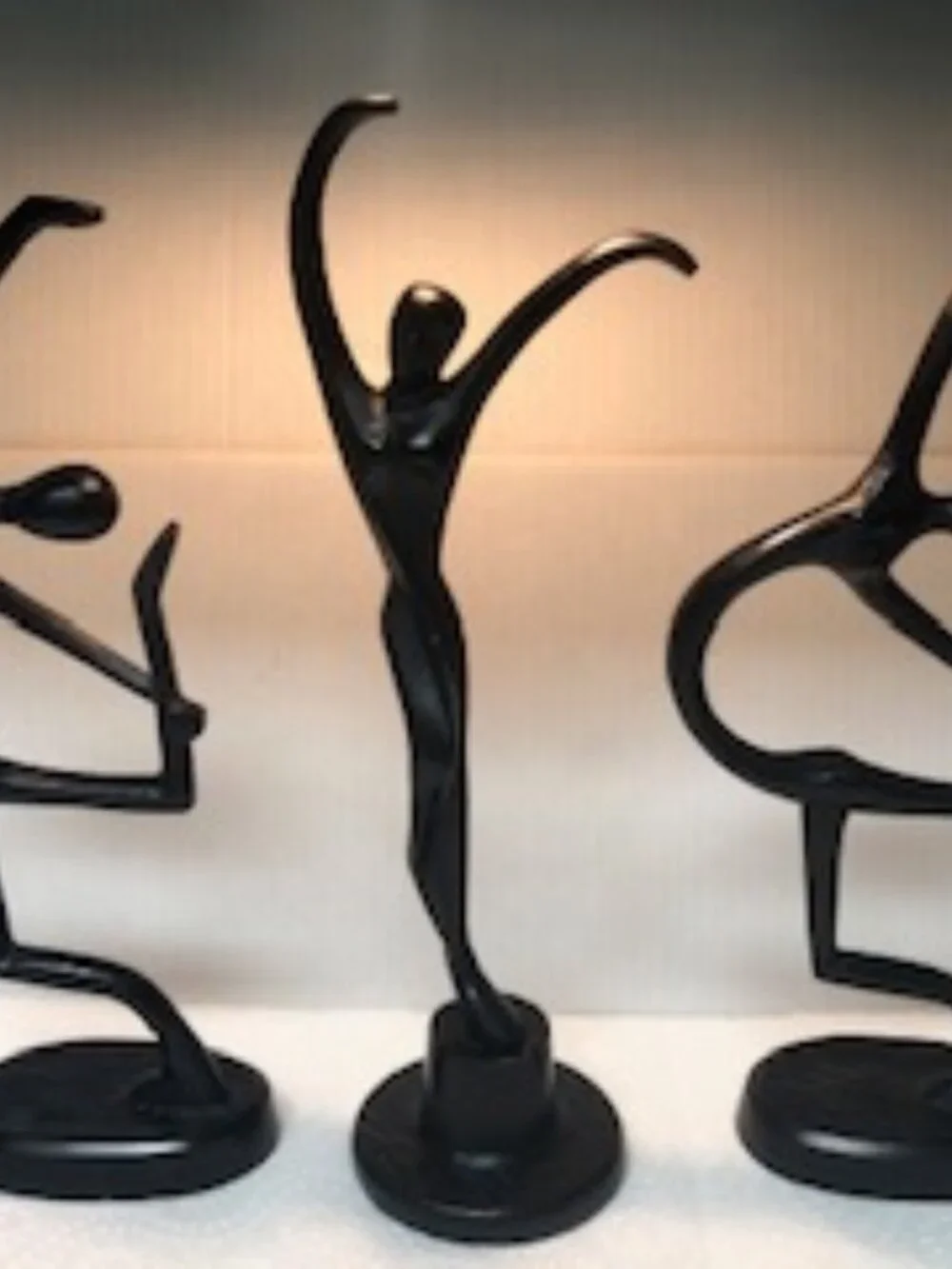 Three dancers female cast metal sculptures designed by Bodrul Khalique for IKEA